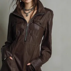 Detail view of a brown PU leather dress featuring a functional front zipper and collar