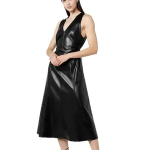 Elegant black V-neck sleeveless PU leather midi dress with cinched waist on model