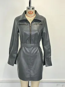 Detail of dark gray PU leather suit dress featuring lapel collar and front zipper
