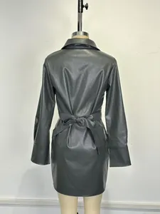 Back view of a stylish grey PU leather blazer dress with a waist belt on a mannequin.