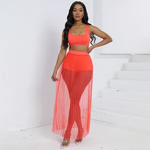 Set sexy da 3 pezzi per donna con crop top corallo e gonna lunga in tulle plissettato