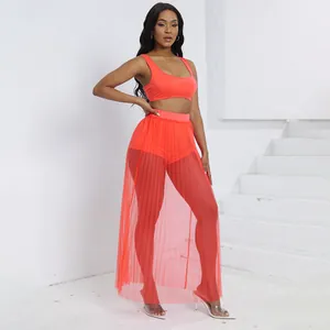 Set da spiaggia arancione 3 pezzi con crop top, pantaloncini e gonna lunga in tulle velato