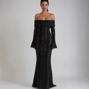 Full view of elegant black lace off-shoulder maxi dress featuring flared bell sleeves