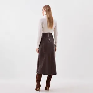 Back view of a long dark brown PU leather A-line skirt with a functional back zipper closure