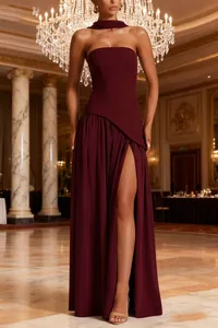 Elegant burgundy strapless evening gown featuring high slit and halter neck ribbon