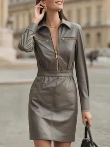 Elegant women's PU leather mini dress with zipper front and waist slimming design