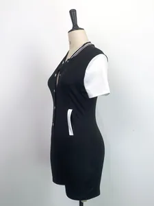 Side profile detail of fashionable slim fit black and white buttoned romper jumpsuit
