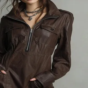 Chic brown faux leather long-sleeved dress featuring a functional front zipper and polo collar