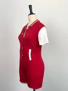 Detailed side view of a stylish women's red and white bodycon button romper on a mannequin.