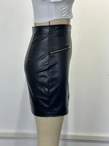 Side detail view of a black slim-fit PU leather mini skirt with decorative zipper