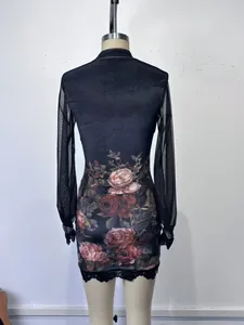 Back view of black bodycon mini dress with mesh sleeves and vintage rose print