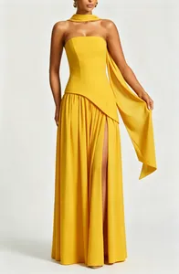 Elegant yellow strapless evening gown featuring a high slit and matching neck scarf detail