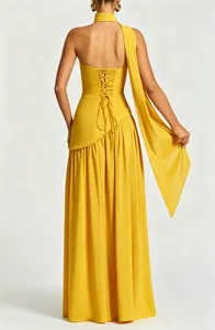Detailed back view of yellow halter maxi dress featuring elegant lace-up and flowing sash