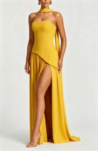 Elegant yellow strapless gown detail featuring a bold high leg slit and slim fit design.