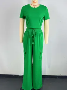 Detailed front view of green two-piece set featuring short sleeve top and cargo wide-leg pants