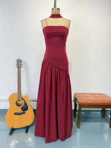 Elegant burgundy halter neck evening dress with thigh-high slit and tube top design