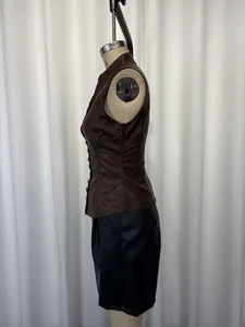 Side view of a brown PU leather sleeveless vest with button-down design on a mannequin.