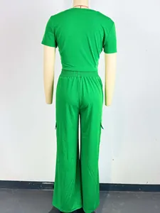 Back view of a women's green two-piece set with a short-sleeve top and wide-leg cargo pants.