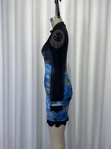 Side view of sexy floral print bodycon dress with sheer mesh sleeves and lace trim