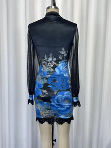 Back view of a floral bodycon dress with sheer mesh sleeves and delicate lace trim.