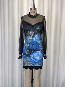 Bodycon mini dress featuring blue floral print with black mesh and lace patchwork details