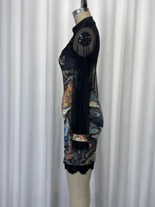 Side view of sexy bodycon dress with feather print, mesh sleeves and lace hem details.
