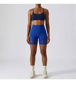 Close-up view of the breathable mesh panels on these royal blue high-waisted yoga shorts.