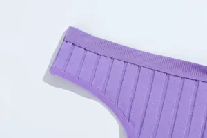 Close-up detail of the purple ribbed fabric waistband on women's breathable cotton thong