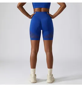 Back view of blue high-waisted yoga shorts with mesh detail and breathable fabric
