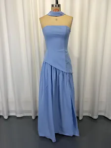 Detail view of light blue strapless gown with high slit and matching neck wrap accessory