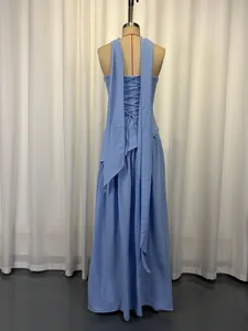 Back view of an elegant light blue strapless dress featuring long ribbons and lace-up details