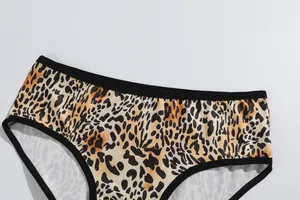 Close-up of leopard print milk silk women's panties with black elastic trim