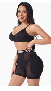 Detail shot of black high waist butt lifting shapewear with lace trim and mesh detail