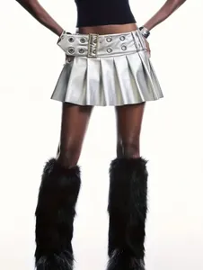 Detail showing silver metallic pleated mini skirt with eyelet belt and fur leg warmers