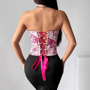 Floral jacquard corset top with back lace-up ribbon detail in pink and white.