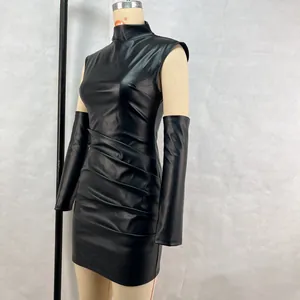 Side view of black PU leather ruched bodycon dress with matching arm sleeves