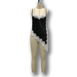 Detail view of a black satin camisole with delicate white lace trim and V-neckline