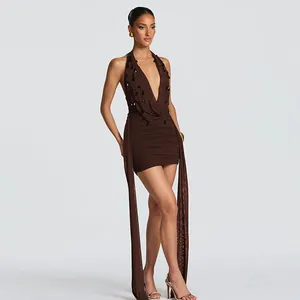Detailed view of brown halter neck bodycon dress with deep V-neck and ribbon accents