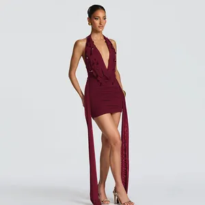 Full view of burgundy deep V halter mini dress with bead drop accents and streamers