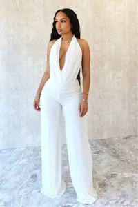 Élégant ensemble deux pièces blanc sexy avec haut licou et pantalon large fluide
