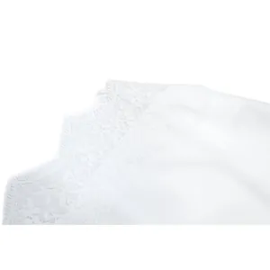 Detailed close-up showing the exquisite white eyelash lace trim on a sexy camisole top