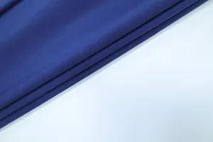 Vista macro di alta qualità della trama del tessuto blu navy con eleganti dettagli