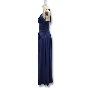 Detailed side view of an elegant navy blue halter neck backless long evening gown