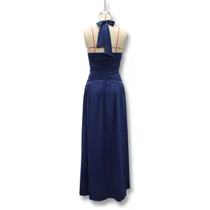 Back view of elegant navy blue halter neck evening dress with ruched details