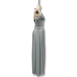 Side view of elegant gray halter neck ruched maxi dress for women's formal party