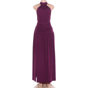 Full front view of purple halter neck long dress with ruched waist and side slit