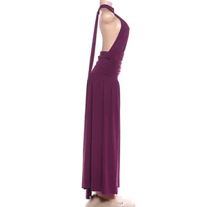 Detailed side profile view of a deep purple halter neck backless maxi dress on mannequin