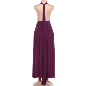 Back view of elegant purple halter neck maxi dress with open back detail on mannequin