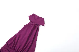 Macro view of a purple halter neck fashion dress showing elegant gathered fabric details