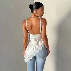 Detailed back view of a white satin camisole with delicate lace trim and backless design